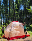 children setting up tent