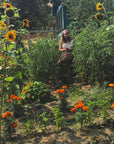 Nici Holt Cline with chicken in her garden