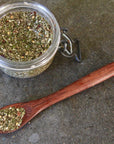 Camp Director's Handcrafted Herb + Spice Blend and small wooden spoon
